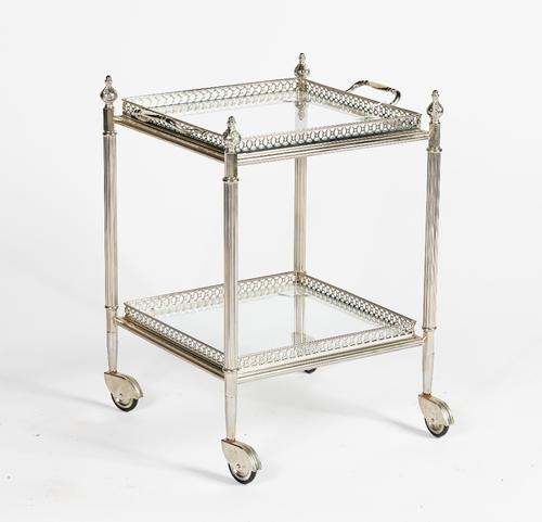 A silvered metal two-tier drinks trolley, with glass based lift-off tray and undertier, 43cm wide x 43 deep x 52cm high.