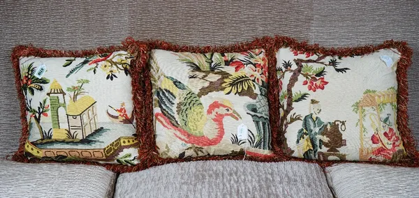 A set of three cushions, with multicoloured bird and Chinese pattern, in 18th century style, trimmed with bobble bands (3).