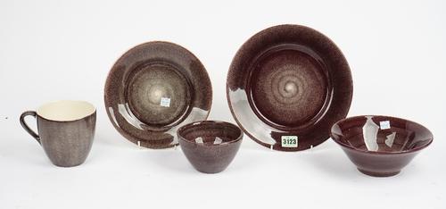 A Portuguese stoneware Meteus breakfast and dinner service with plum glaze (qty).