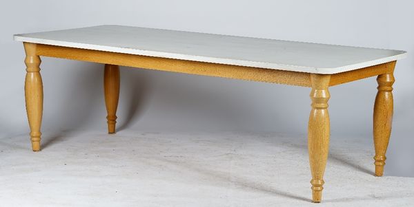 A contemporary kitchen table, with white painted rectangular top, on turned oak legs, 231cm wide x 75cm high.