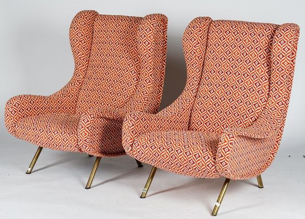 A pair of vintage Zanuso armchairs with tubular metal frames, upholstered in cream, orange and burgundy abstract woven fabric, 74cm wide x 100cm high