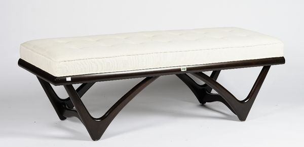 A contemporary rectangular bench, with curved support, button-down upholstered in white linen, 139cm wide x 45cm high.