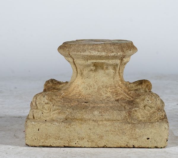 A pre-cast plinth in classical style, 27cm wide x 20cm high.