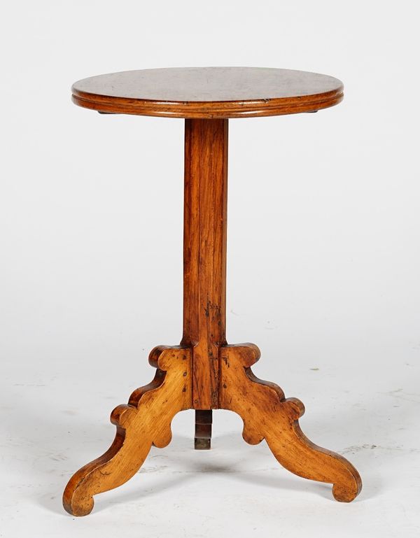 A stained pine pedestal table, 19th century, with a circular top, on a pillar and tripod base, 37cm wide x 57cm high.