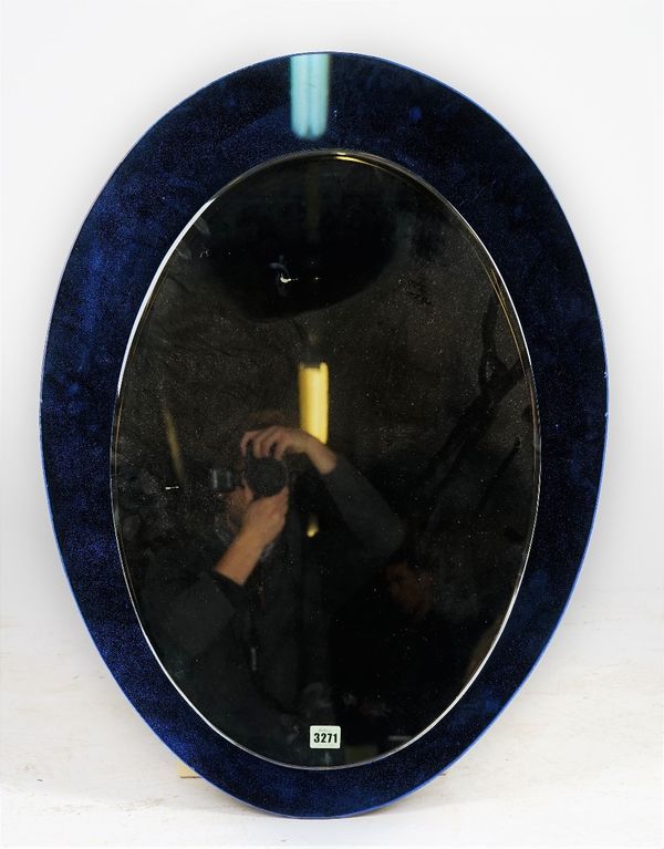 An oval wall mirror, with wide blue frame, 59cm wide x 80cm high.