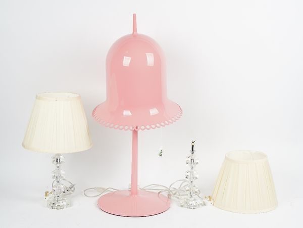 A Lolita pink table lamp, with a pivoting shade, and a pair of hexagonal table lamps, with cream silk shades (3), pink lamp; 78cm high, hexagonal lamp