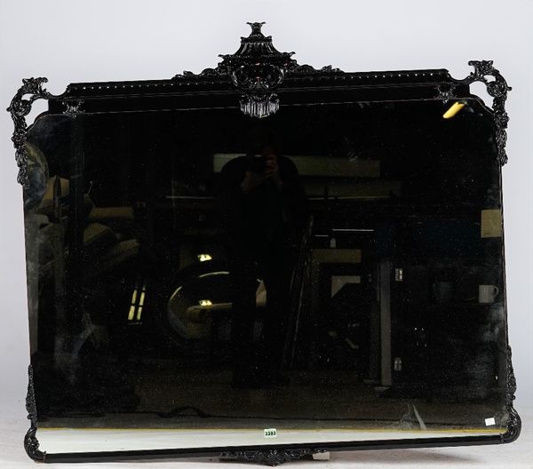 An overmantel mirror, the black lacquered frame with foliate ornament, in Chinese Chippendale style, 130cm wide x 120cm high.