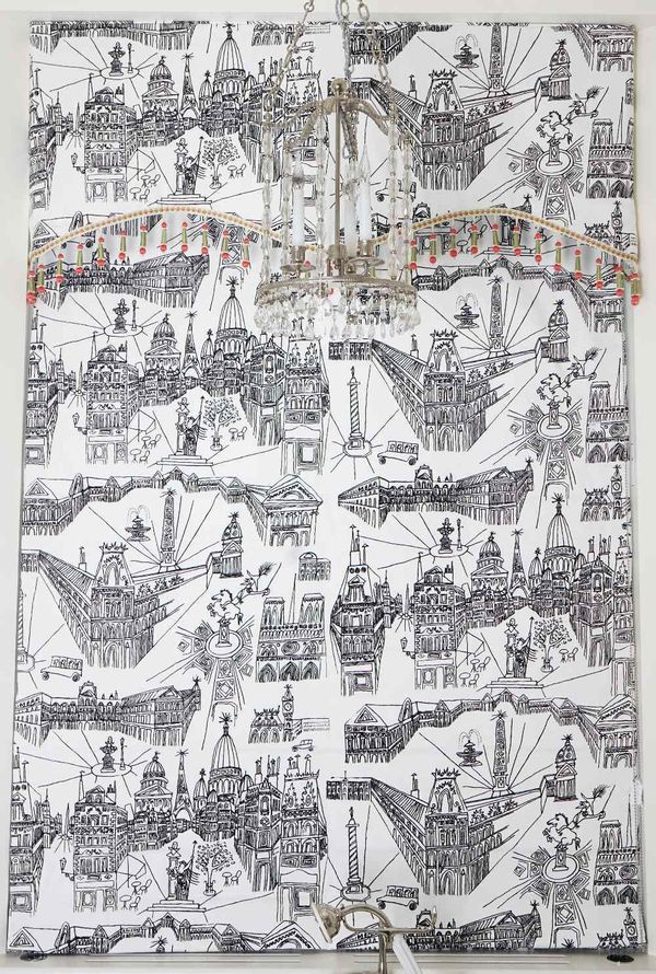 A Roman blind, printed with city scenes, 128cm wide x 186cm high