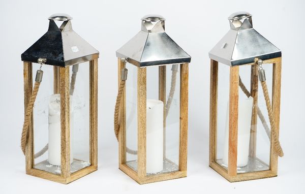 A chromium plated folding candle holder, the cylindrical columns supporting six spheres and a set of five lanterns (6), 50cm high.