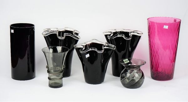 A Mason Moreth Lera Hoiseeva design smoky glass vase, another, two amethyst glass vases, a pair of black glass crimped vases and another smaller match