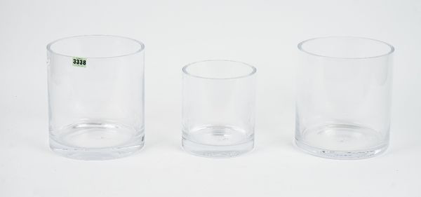 A set of eight Denizli heavy plain cylindrical glass vases, four smaller similar and another (13).