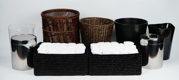 Six various waste bins, a pair of stainless steel waste bins, a collection of candles and two baskets of white guest flannels (qty).