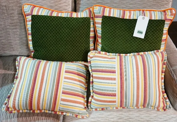 A pair of striped cushions with a central green panel, and another pair of striped cushions (4).