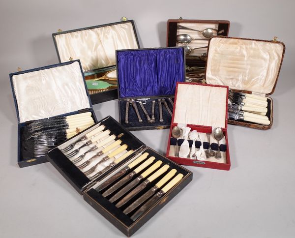 A group of seven cased flatware sets, (7). S5T