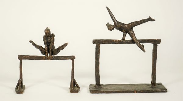 A patinated contemporary bronze modelled as a female gymnast on a highbar, indistinctly signed, 19cm high, and a similar bronze model, 15cm high, (2).