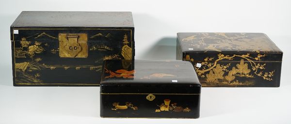 A set of three graduated Chinese wooden chests, early 20th century, with gilt chinoiserie decoration, 50cm wide, a Japanese lacquered box and cover, e