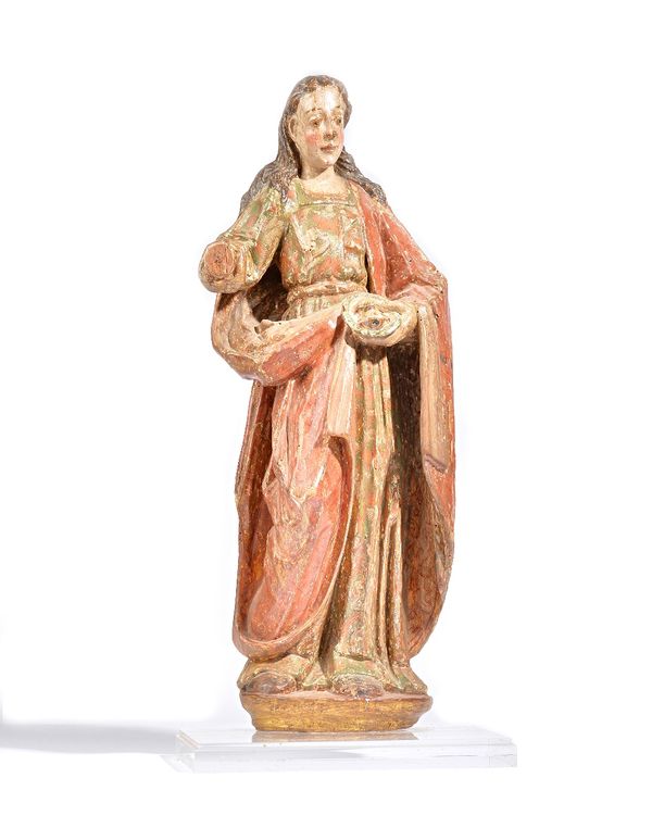 A polychrome painted wooden figure, possibly 17th century, wearing a long red robe, holding a bowl containing two eyes, mounted on a perspex plinth, (