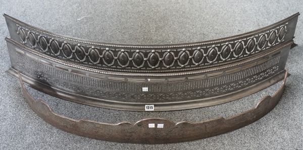 An Empire steel fire kerb, with pierced bowfront and stepped plinth, 108cm wide, another similar larger Empire steel fire kerb, 122cm wide, and a stee