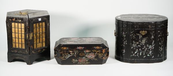 A Chinese chinoiserie decorated table cabinet, early 20th century, of hexagonal form containing, a lidded bowl, plates and various food storage boxes,