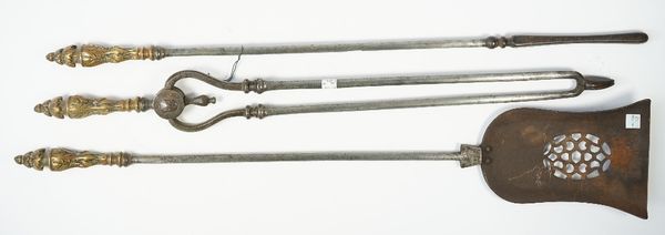 A set of three Victorian steel fire tools with pierced plate and foliate cast brass handles, shovel 78cm, (3).