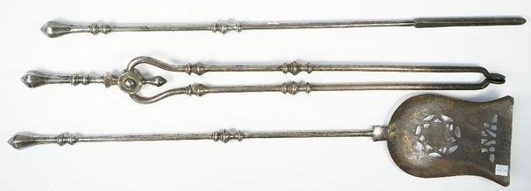 A set of three Victorian steel fire tools, with octagonal tapering handles and knopped shafts, shovel 78.5cm, (3).