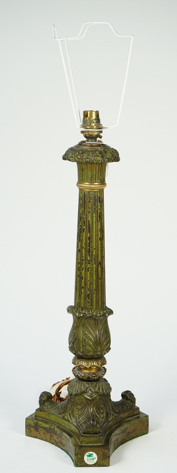 A Victorian style gilt metal table lamp of Corinthian column form with later distressed green paint, 46cm high.