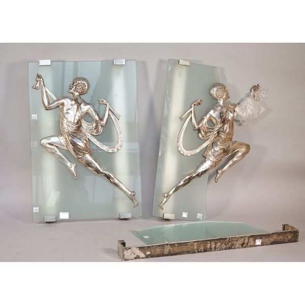 A pair of Art Deco silvered metal and frosted glass wall lights, in the manner of Pierre Le Faguays, circa 1930s, 56cm x 38cm (one glass broken).