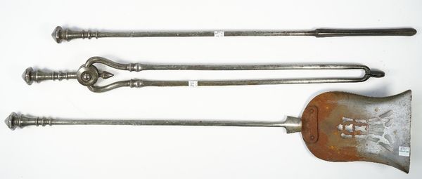 A set of three Victorian steel fire tools, with octagonal tapering handles and knopped shafts, shovel 73.5cm, (3).