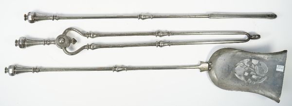 A set of three Victorian steel fire tools, with octagonal tapering handles and knopped shafts, shovel 77cm, (3).