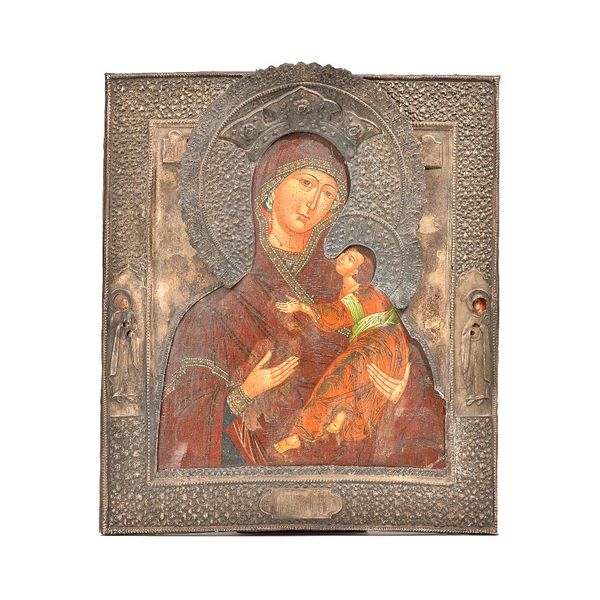 A Russian Icon, All-Hymed Mother of God, polychrome painted with white metal oklad, 44cm x 38cm.