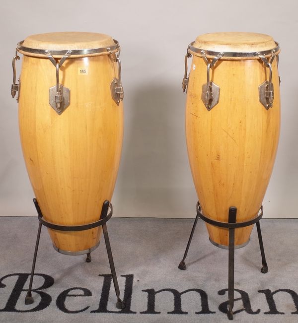 Two similar bongo type drums on stands, (2).  E5