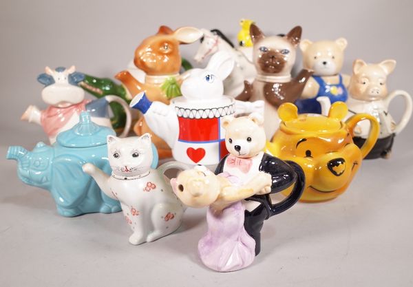 A quantity of 20th century novelty tea pots formed as various animals, the largest 23cm high,  (four lacking lids), (qty). S5M