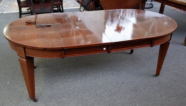 A 19th century satinwood banded circular mahogany extending dining table, on tapering square supports with a pair of extra leaves, 106cm diameter x 19