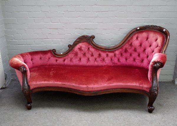 A Victorian mahogany framed double spoon back chaise longue, with serpentine seat on squat scroll supports, 195cm wide x 89cm high.