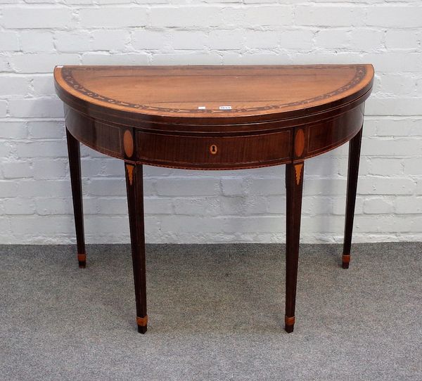 A George III floral marquetry inlaid walnut and satinwood banded semi-elliptical tea table with single frieze drawer, on tapering square supports, 101