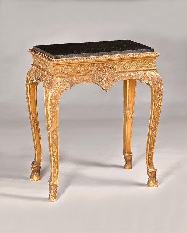 A George II style silver table, the rectangular marble inset top on a gilt base with floral moulded frieze on four acanthus scroll supports and hoof f