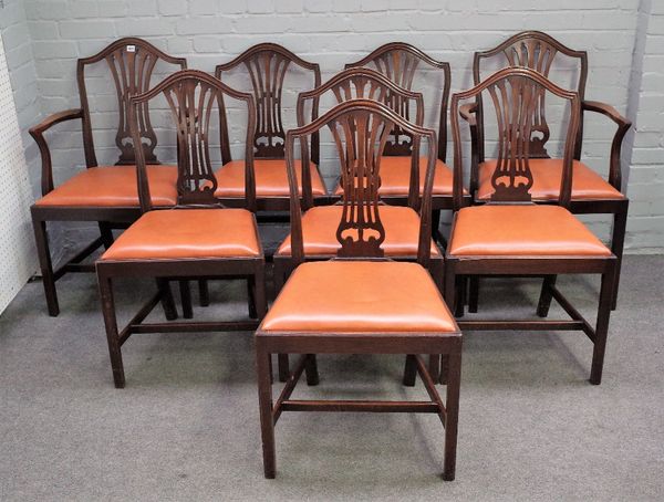 A set of eight George III style mahogany dining chairs, on square supports, to include a pair of carvers.