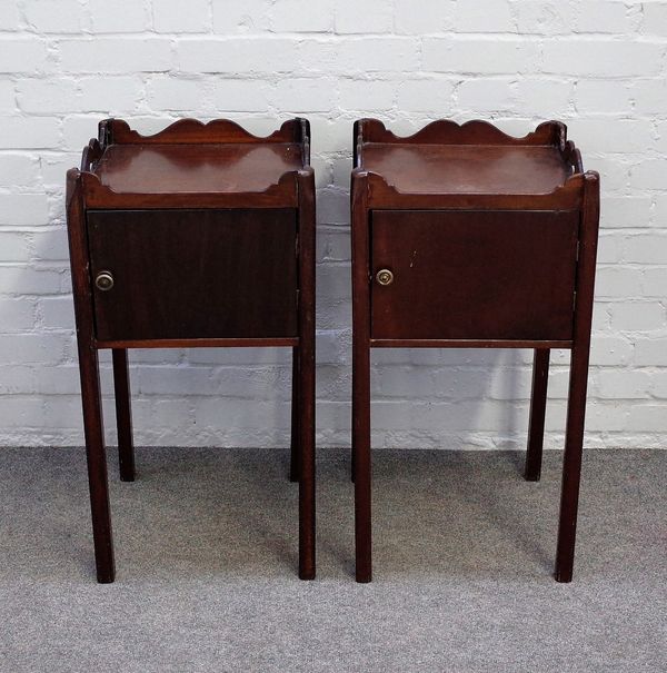 A pair of George III mahogany tray top single door night stands, on canted square supports, 38cm x 78cm high.