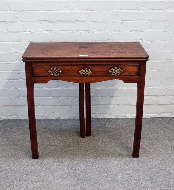 A mid-18th century mahogany tea table with double gate leg action, on canted square supports, 77cm wide x 73cm high.