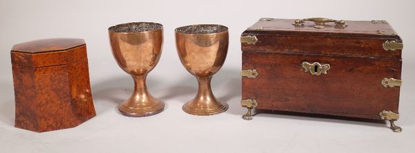 A 19th century oak and brass bound rectangular tea caddy on brass claw feet, 24cm wide x 15cm high, a Regency style burr yew wood octagonal tea caddy,