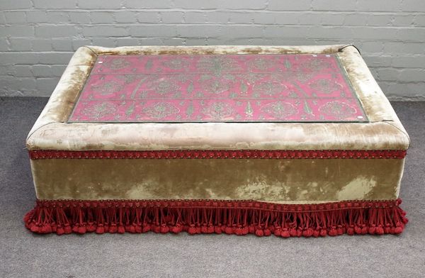 A large rectangular green velvet upholstered coffee table/foot stool, 140cm wide x 41cm high.