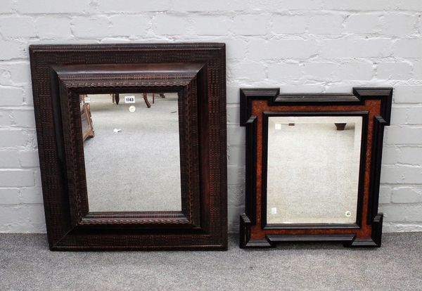 A late 17th century Dutch mirror with swept walnut wriggle work frame, 63cm wide x 74cm high.