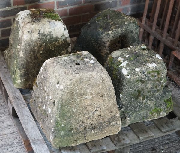 Four various staddle stone base of tapering square form, each approx. 37cm high.