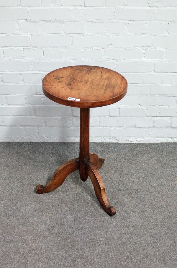 A 19th century provincial French elm and pine circular tripod occasional table, 42cm diameter x 76cm high.