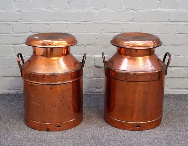 A pair of early 20th century polished copper twin handle milk churns, one stamped 'UDWL TROWBRIDGE', each 50cm high.