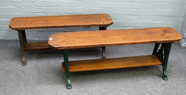 Two 19th century and later benches, each with stained pine tops on green painted cast iron supports, 122cm long x 105cm long x 41cm high.