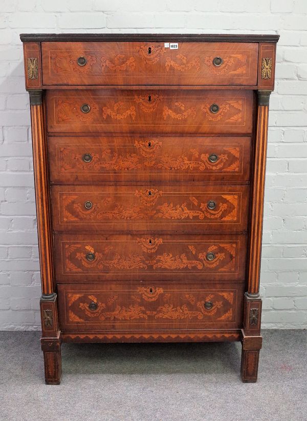 An early 19th century Dutch gilt metal mounted floral parquetry inlaid tall chest of six long drawers, flanked by turned columns, 101cm wide x 156cm h