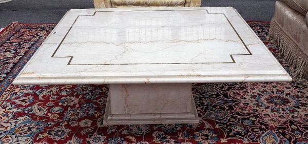 A 20th century marble coffee table, the brass inlaid square top on block column and stepped base, 110cm wide x 41cm high.