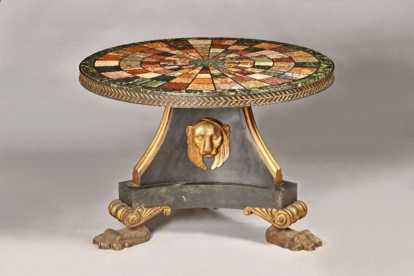 A Regency design centre table, the specimen marble circular top in a floral cast metal band over a parcel gilt bronze base of flared rectangular form