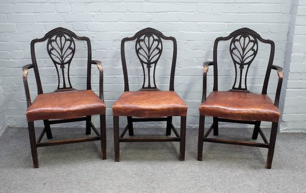 A set of eleven George III mahogany dining chairs, with splat and channelled square supports, to include a pair of carvers, (11).